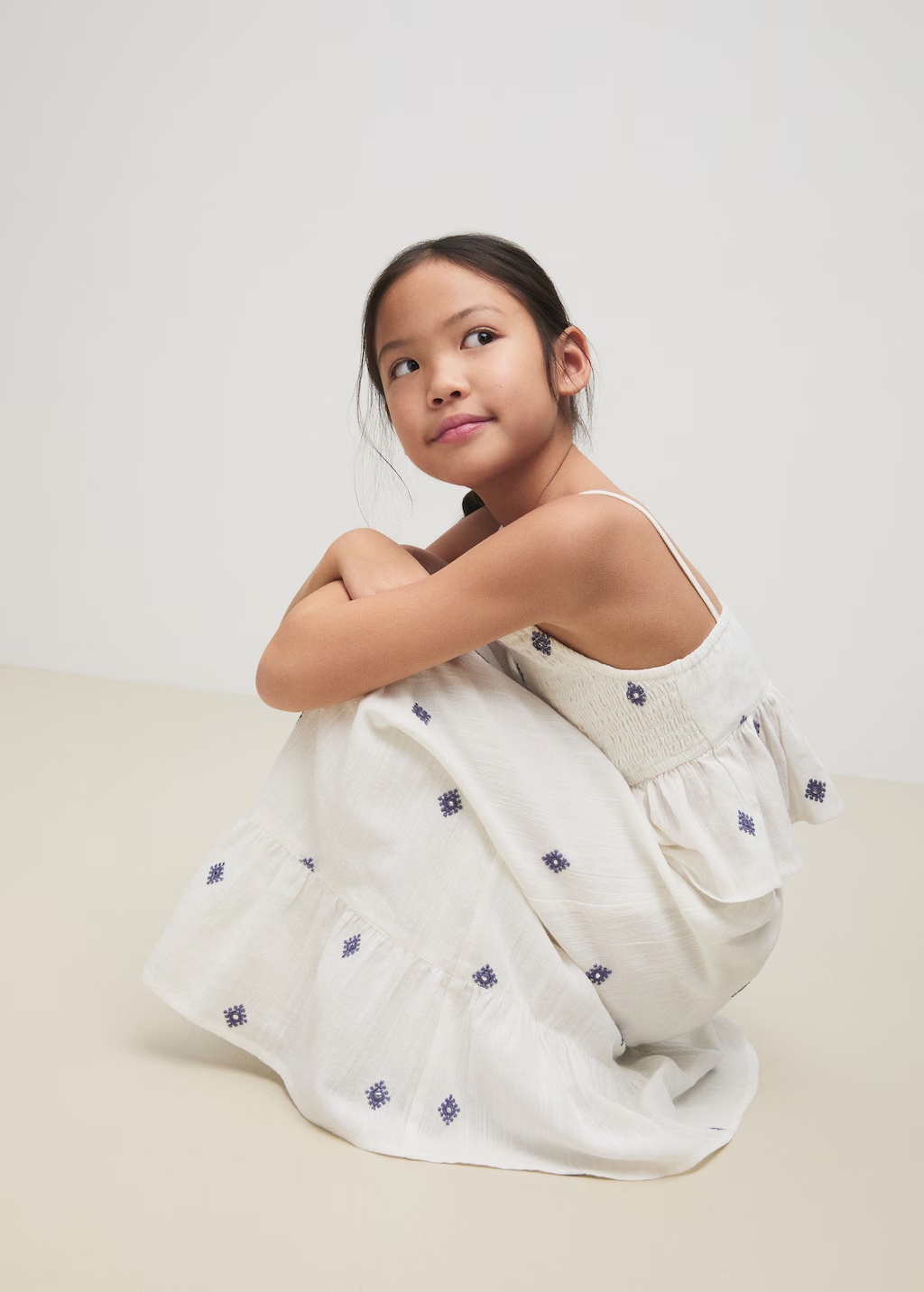 Ruffled blouse with embroidered details