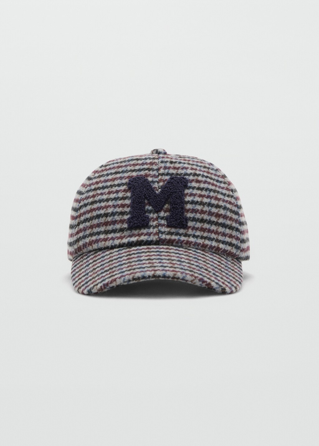 Tweed cap with letter