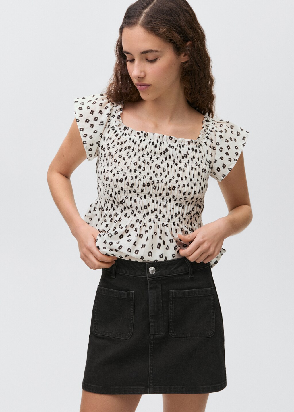 Denim mini-skirt with pockets