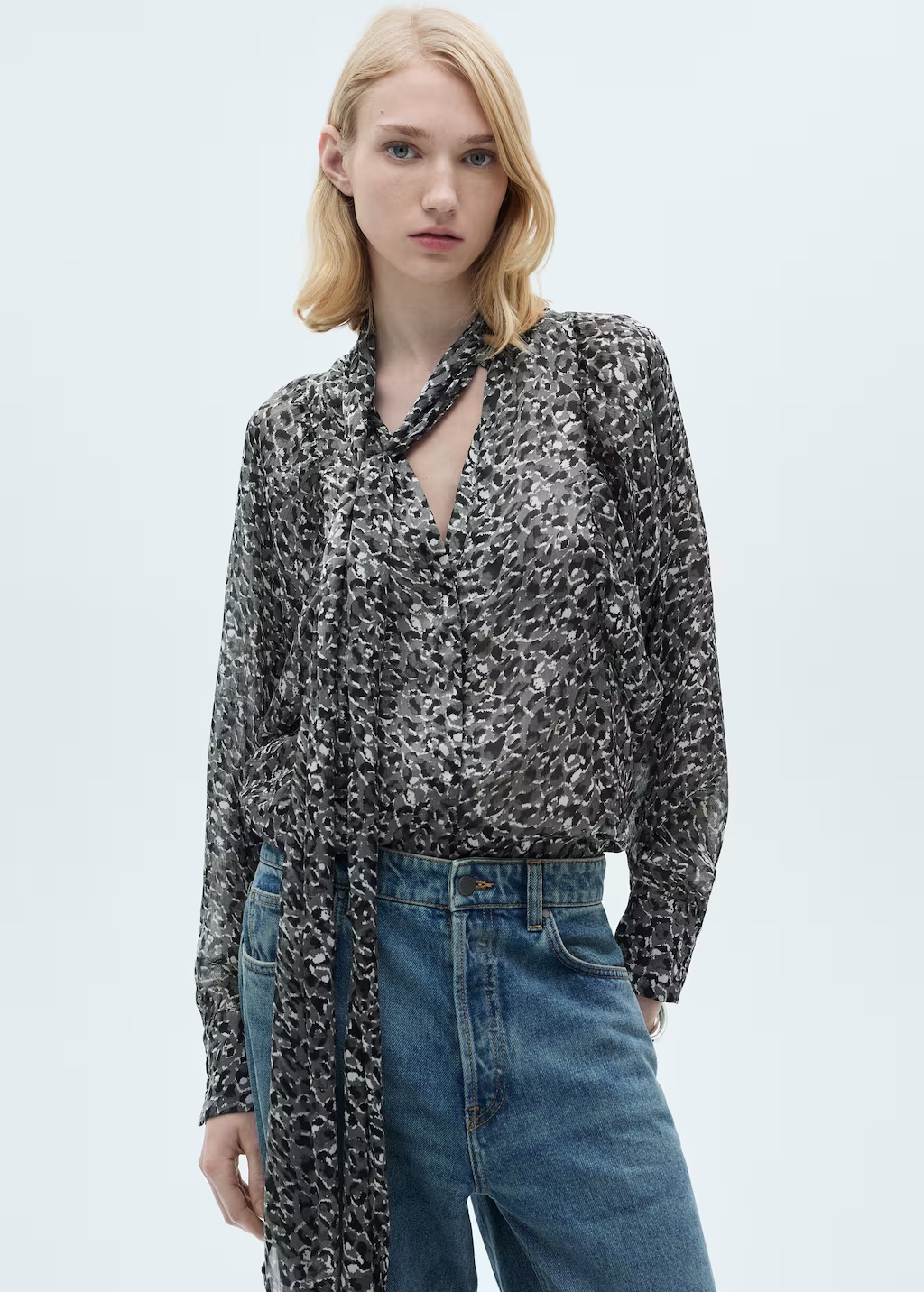 Animal-print blouse with bow neck