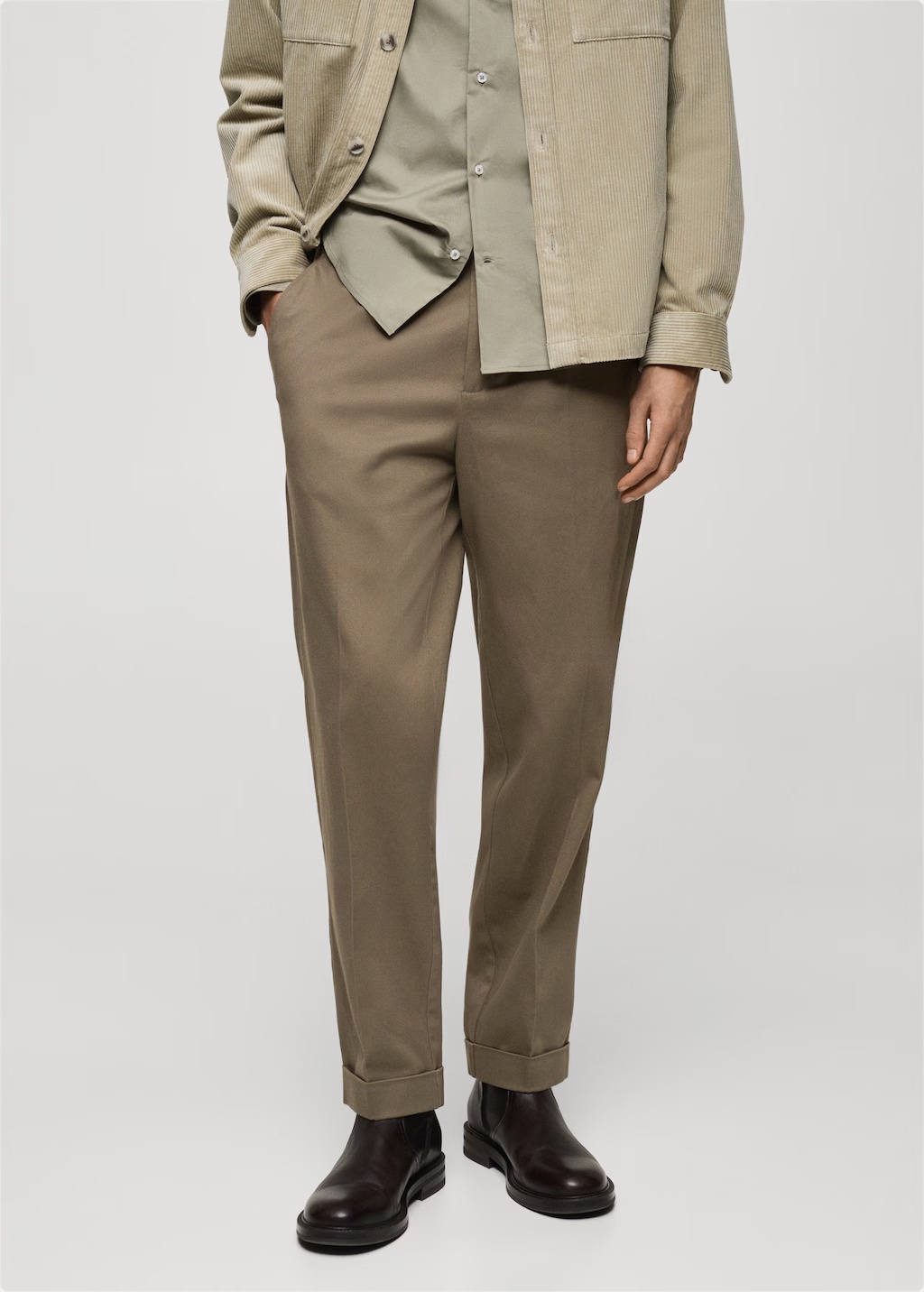 Pleated pants under cuff