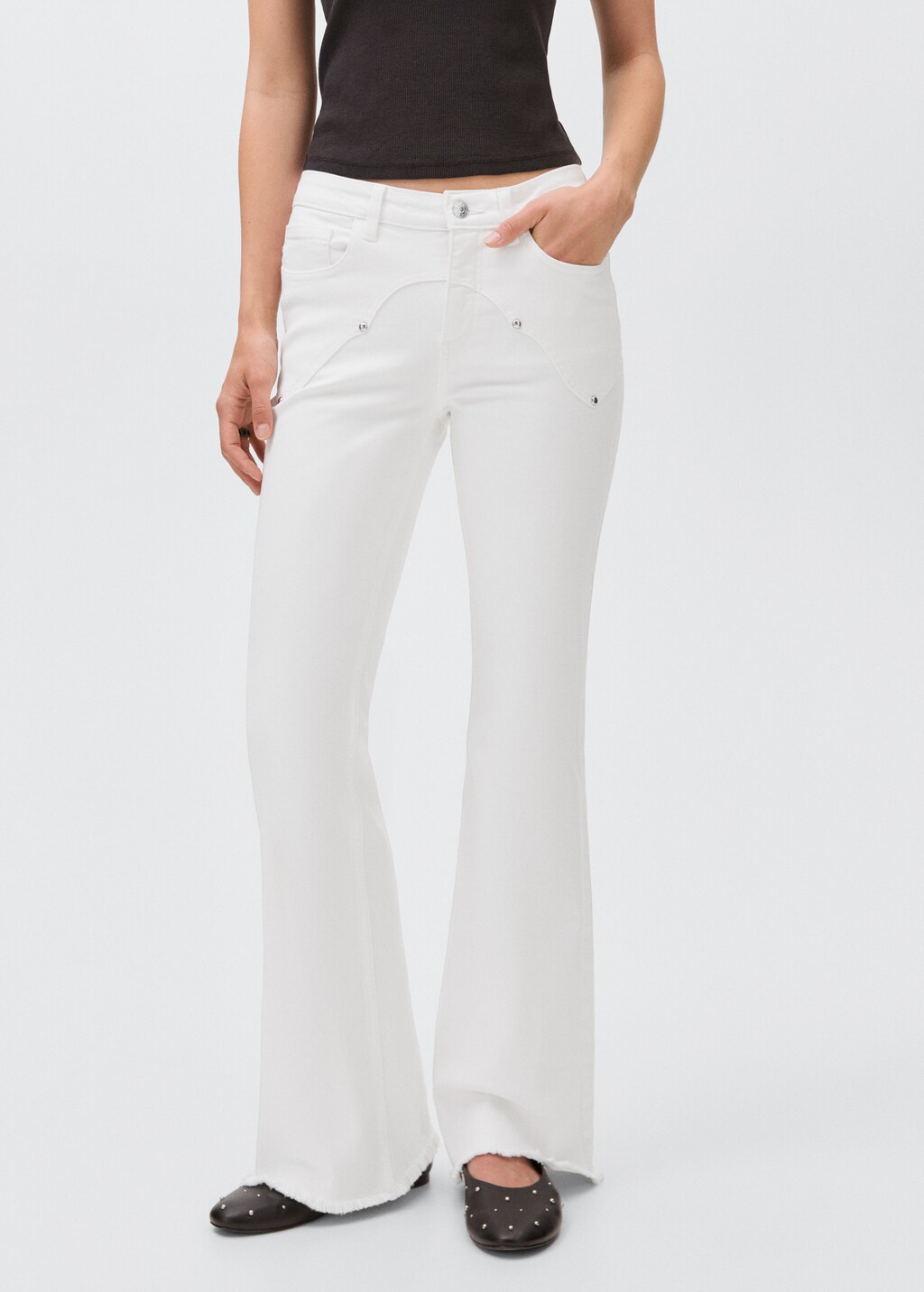 Flared jeans with studs