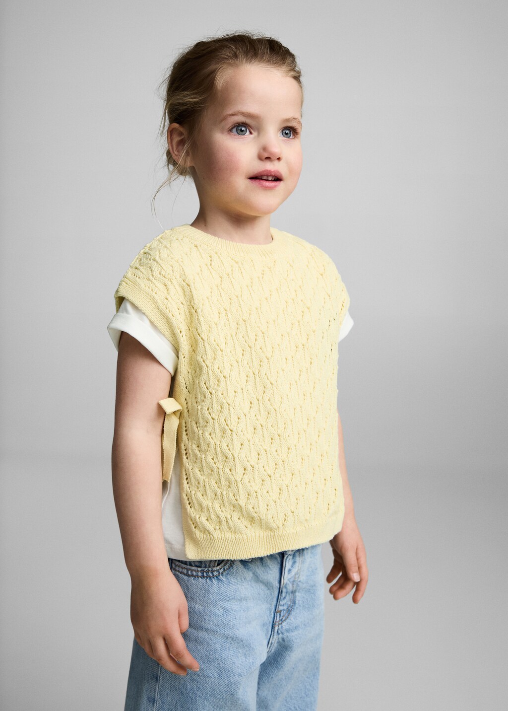 Knitted gilet with openwork details