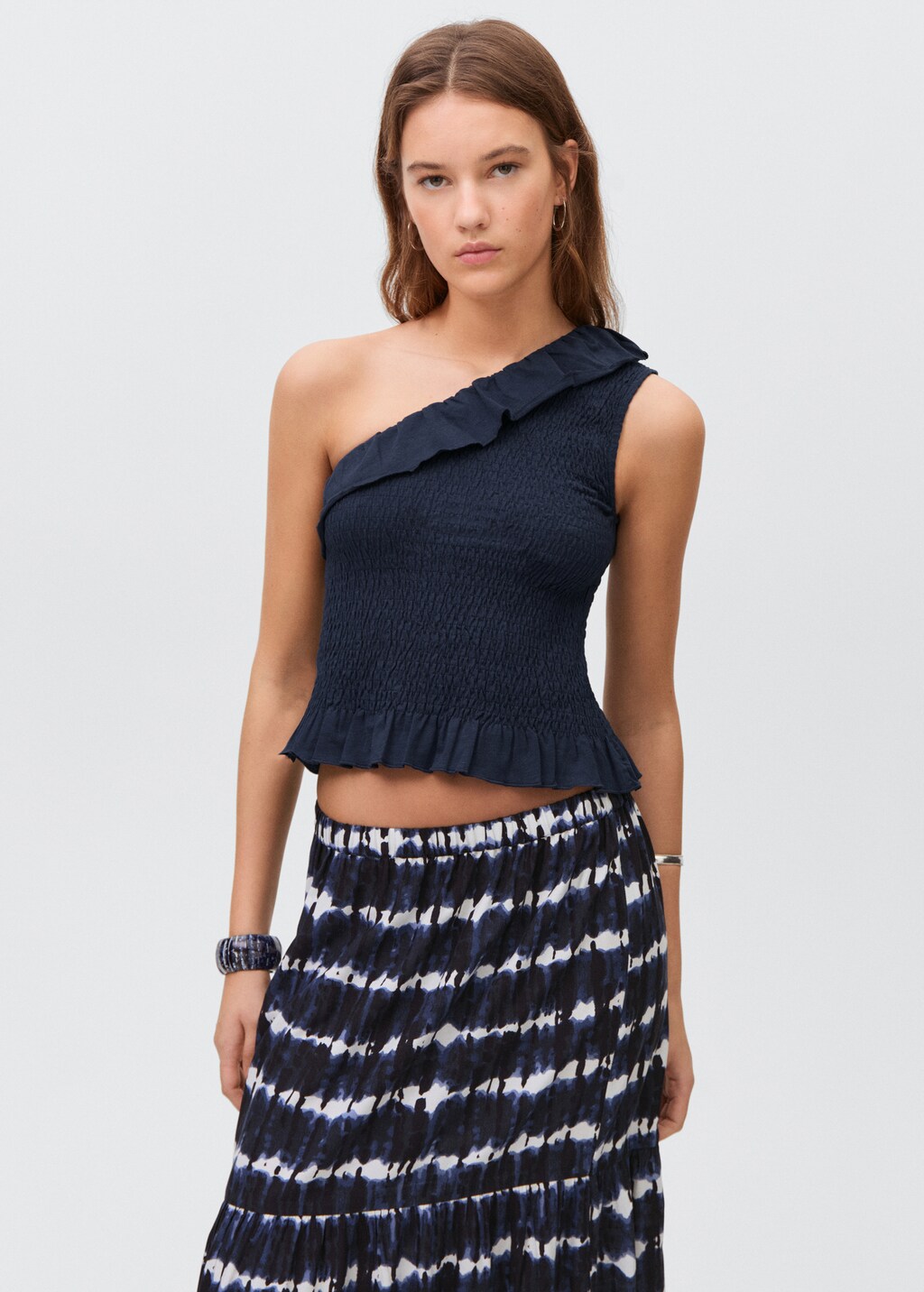 Asymmetric flounces top
