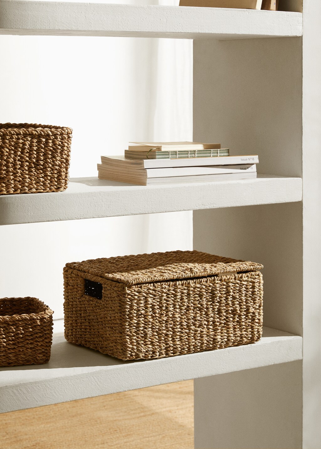 Small braided basket with handles