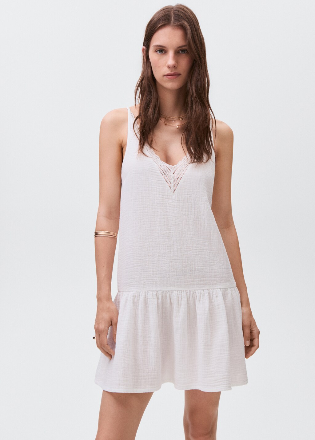 Dress with lace flounces