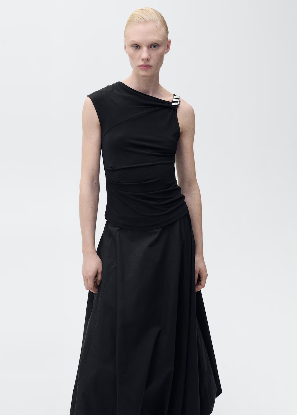 Asymmetrical top with metallic appliquÃ©