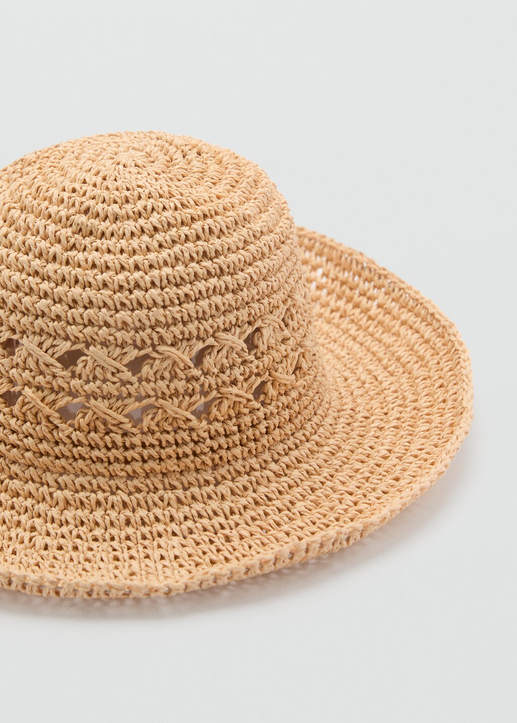 Natural fiber hat with openwork details