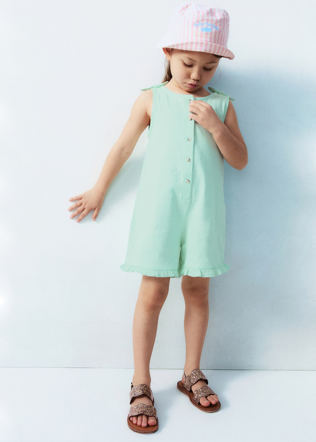 Short jumpsuit with bow detail