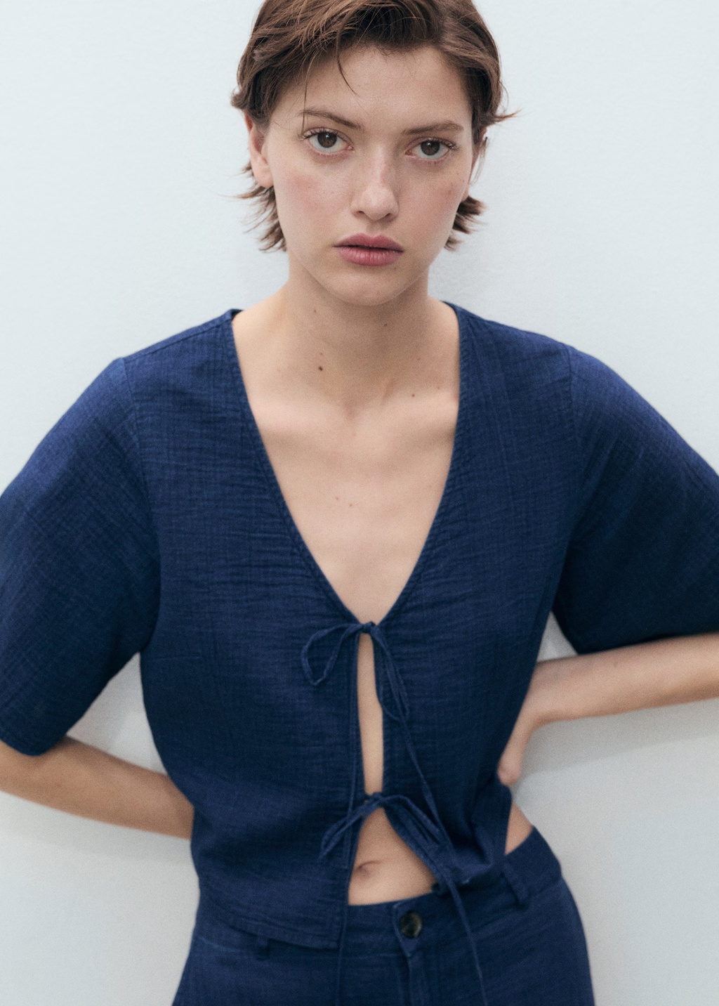 Flowy denim top with bows