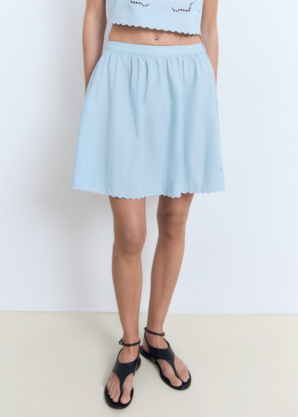 Embroidered skirt with scalloped hem