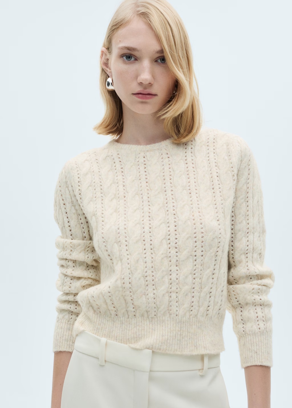 Braided sweater with openwork details