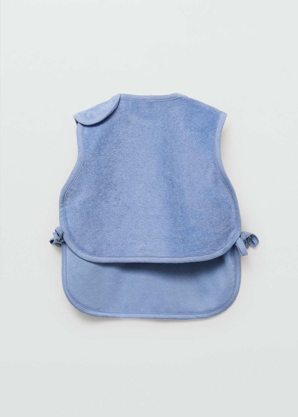 Terry cloth bib with embroidered details