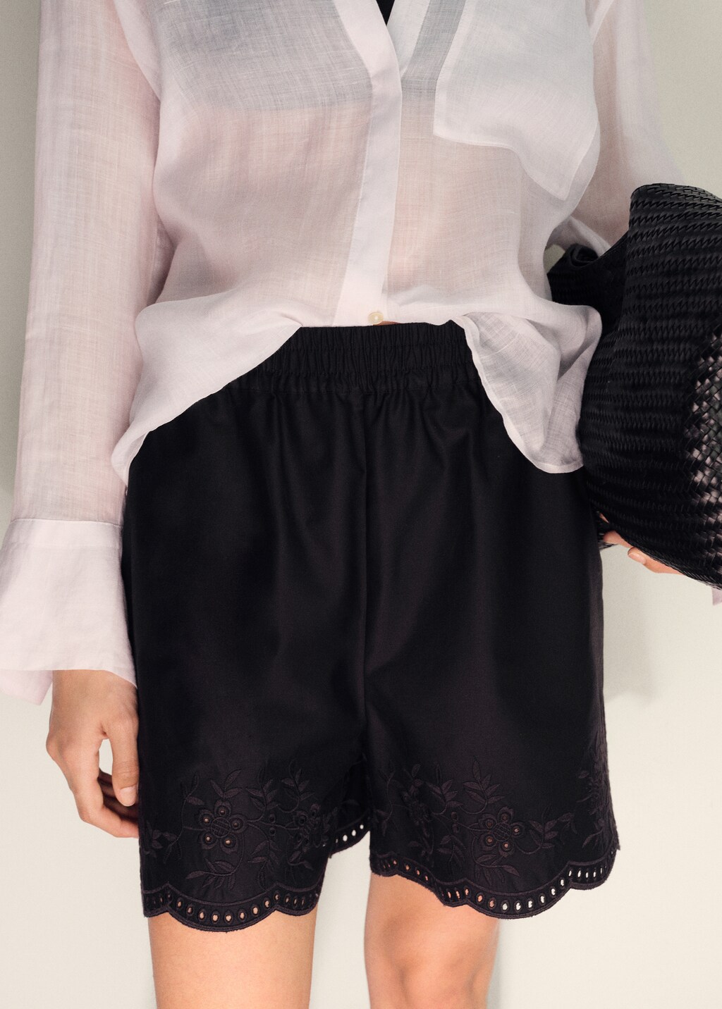 Satin shorts with embroidered hem