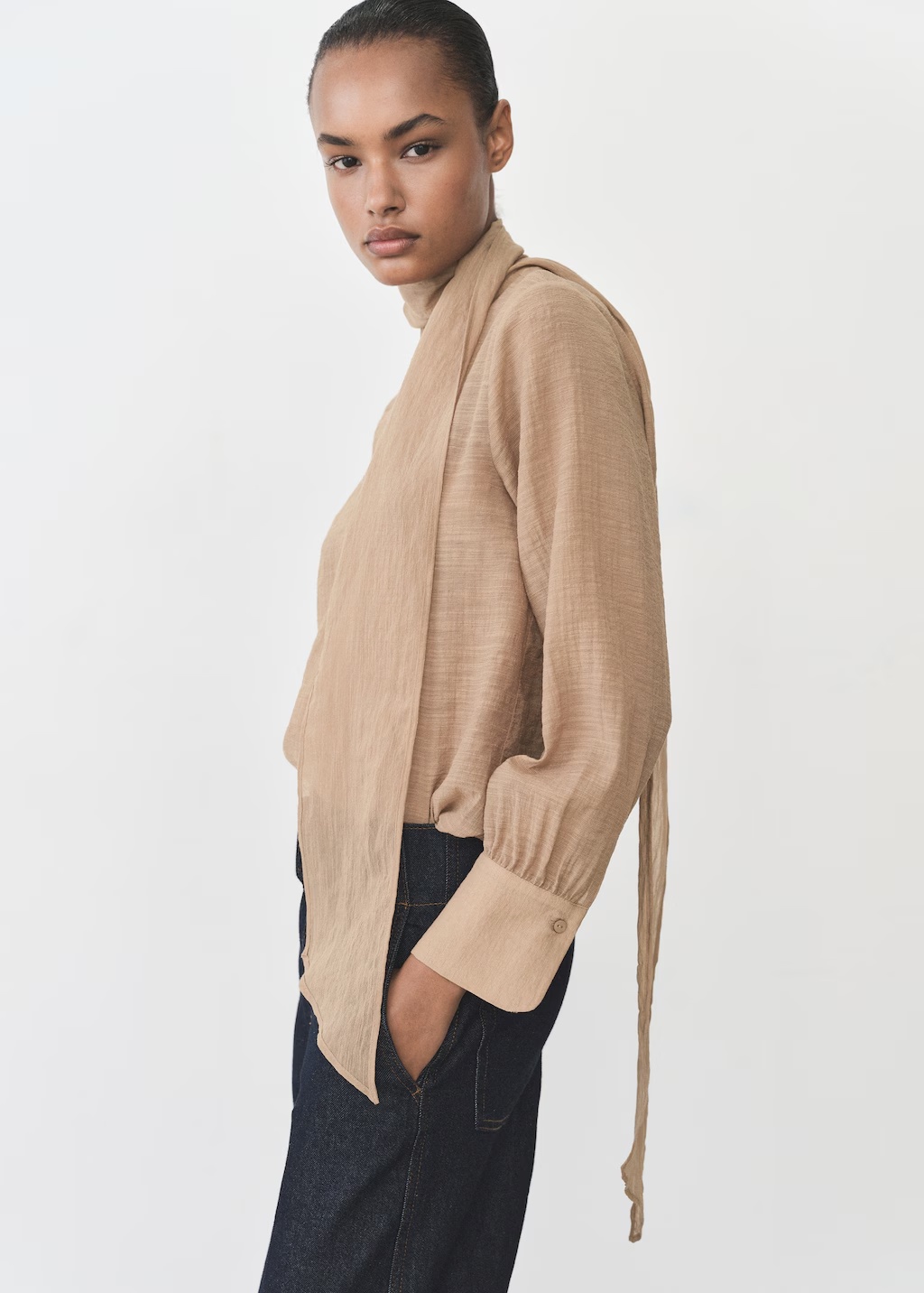 Textured blouse with bow