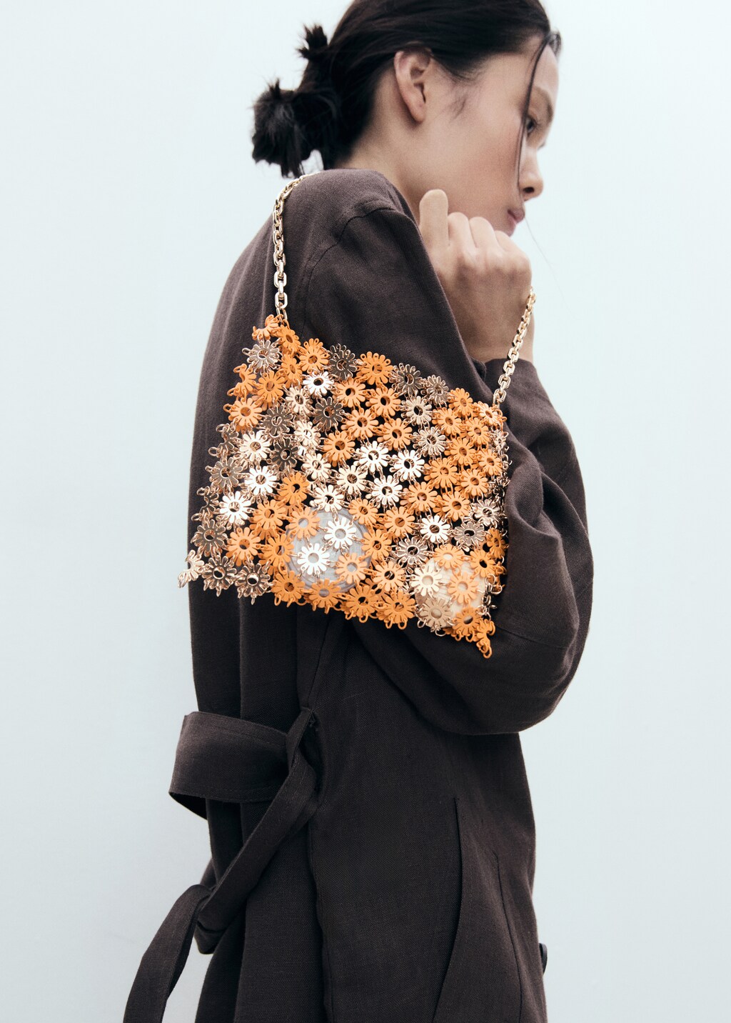 Shoulder bag with metallic flower
