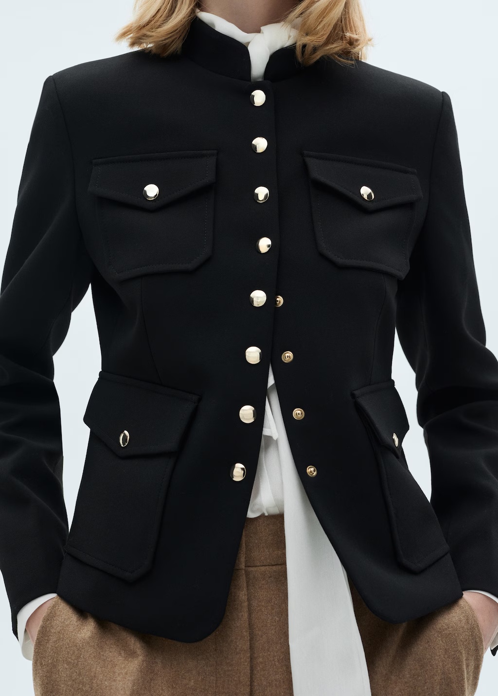 Jacket pockets with button detail