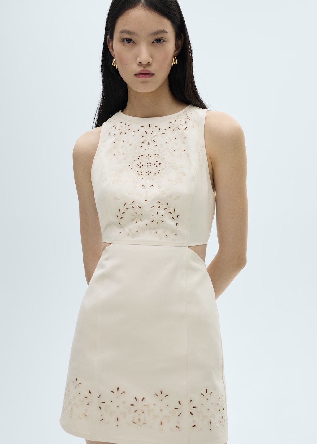 Dress with openwork details and openings
