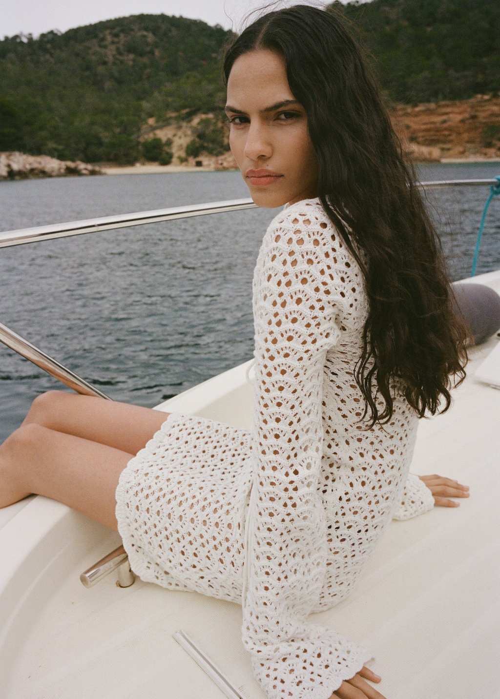 Mini crochet dress with bow