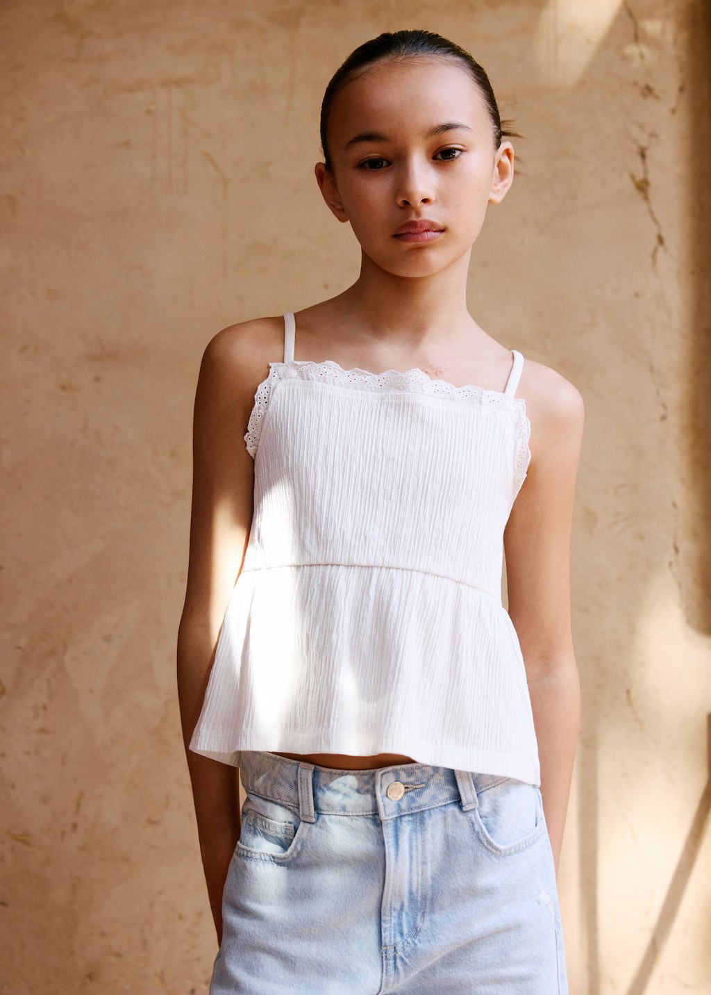 Top with Swiss embroidery detail