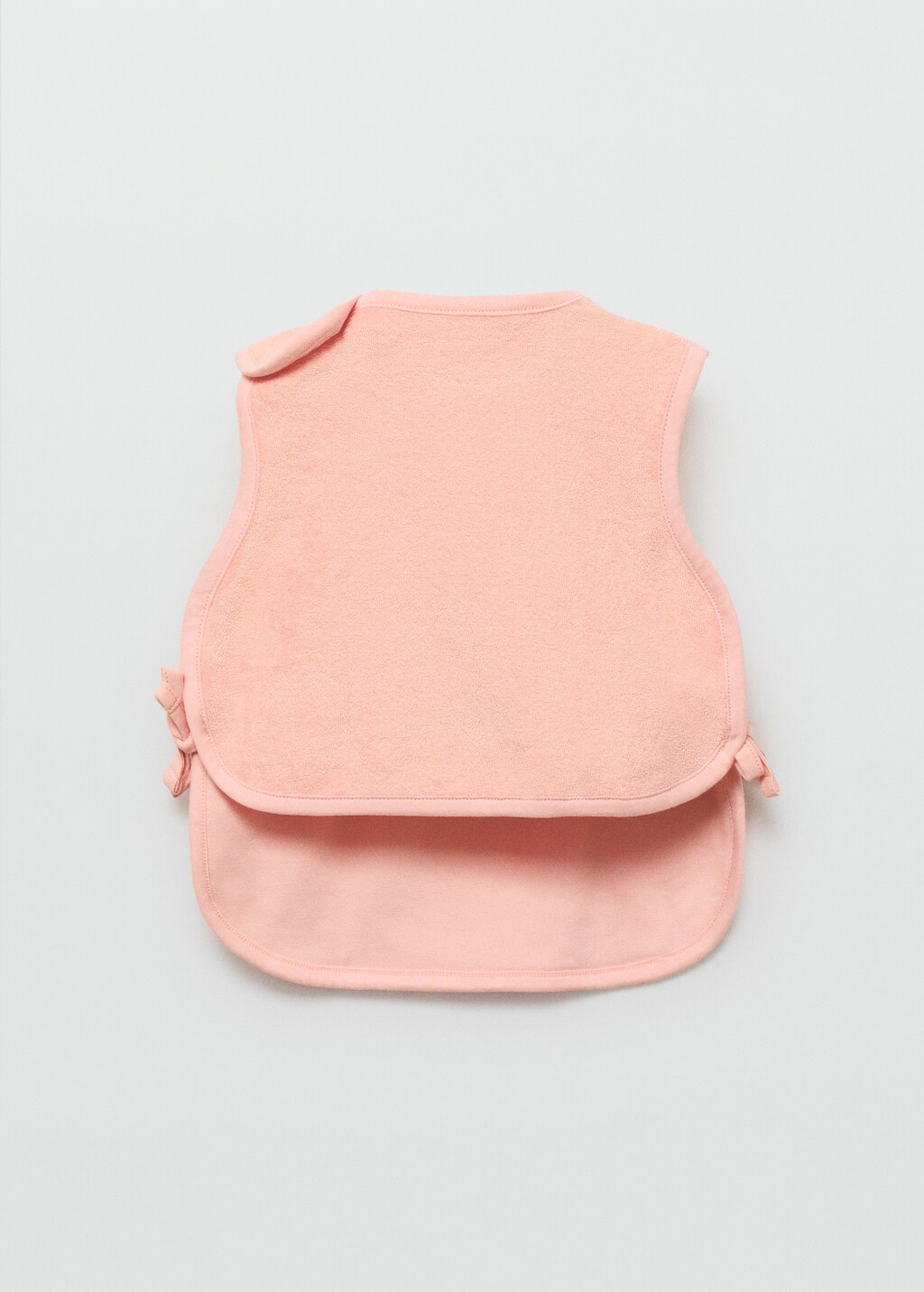 Terry cloth bib with embroidered details