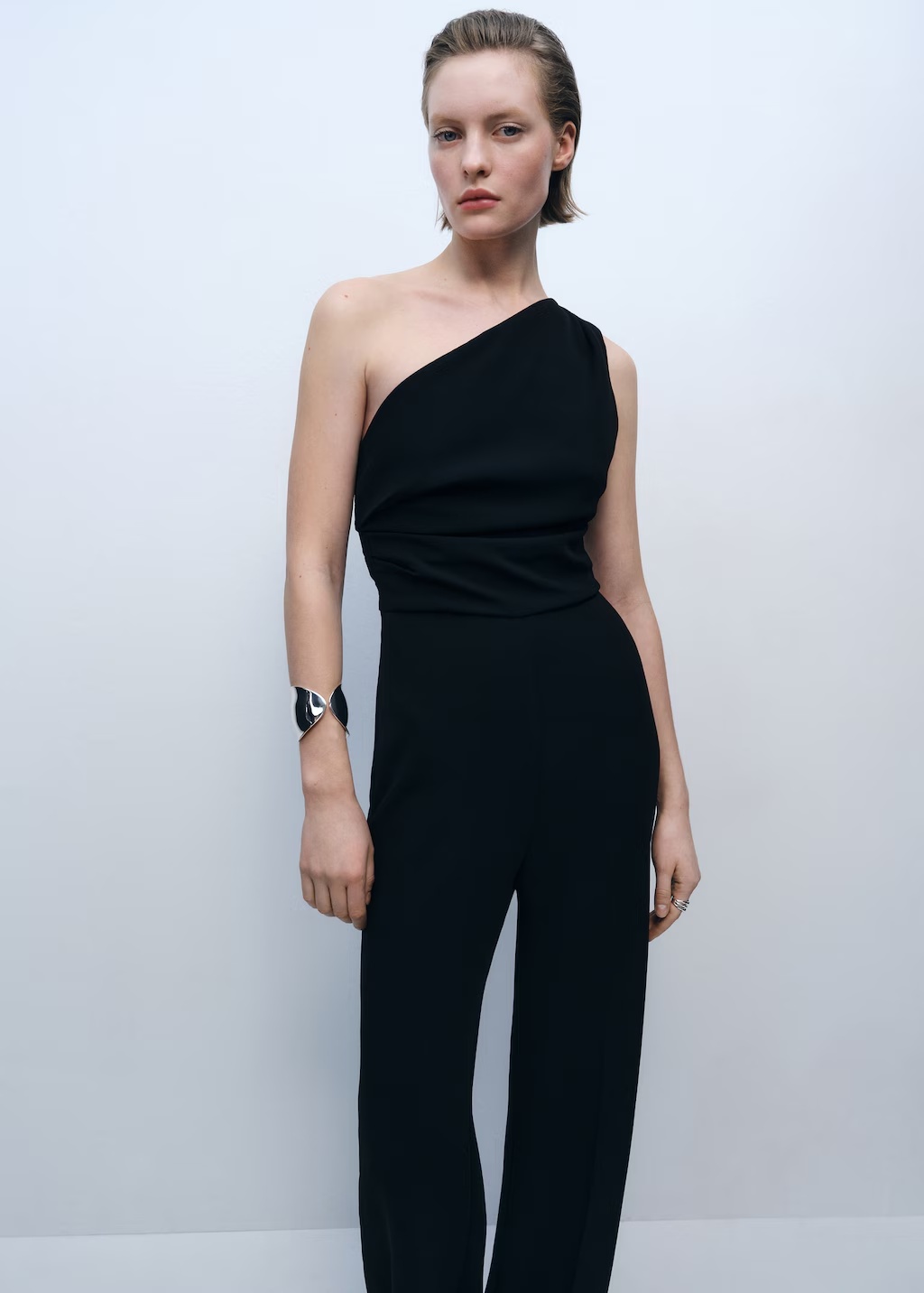 Asymmetrical jumpsuit with draped detail