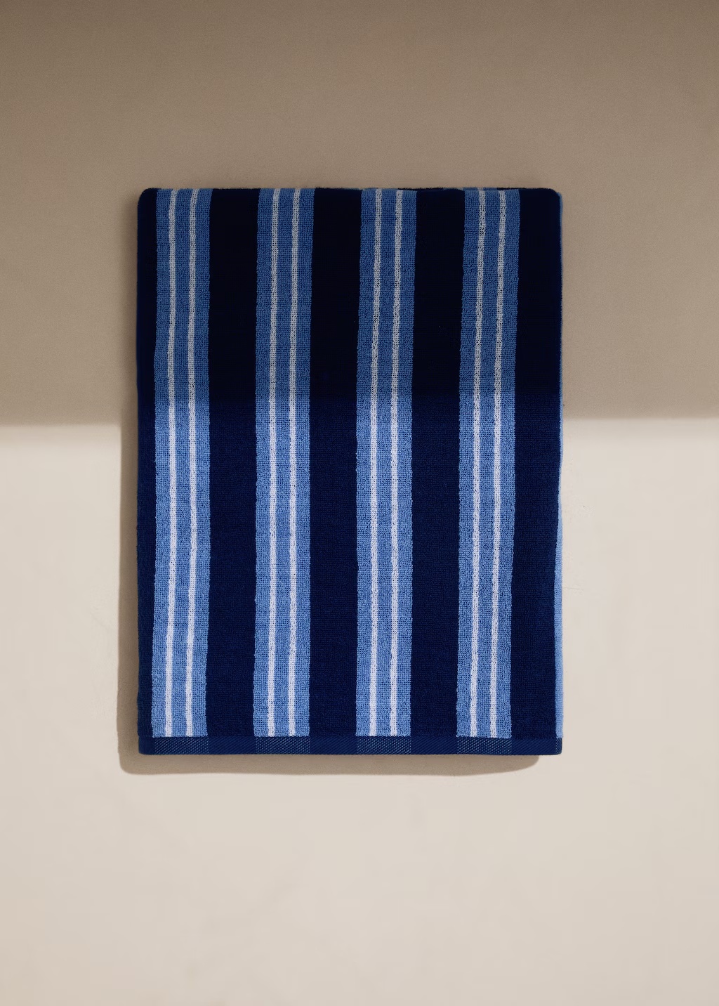 Multi-coloured striped beach towel