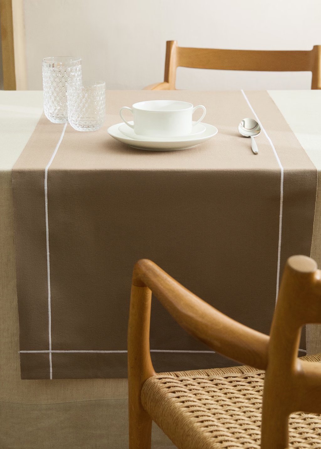 Cotton embroidered table runner with scalloped detail