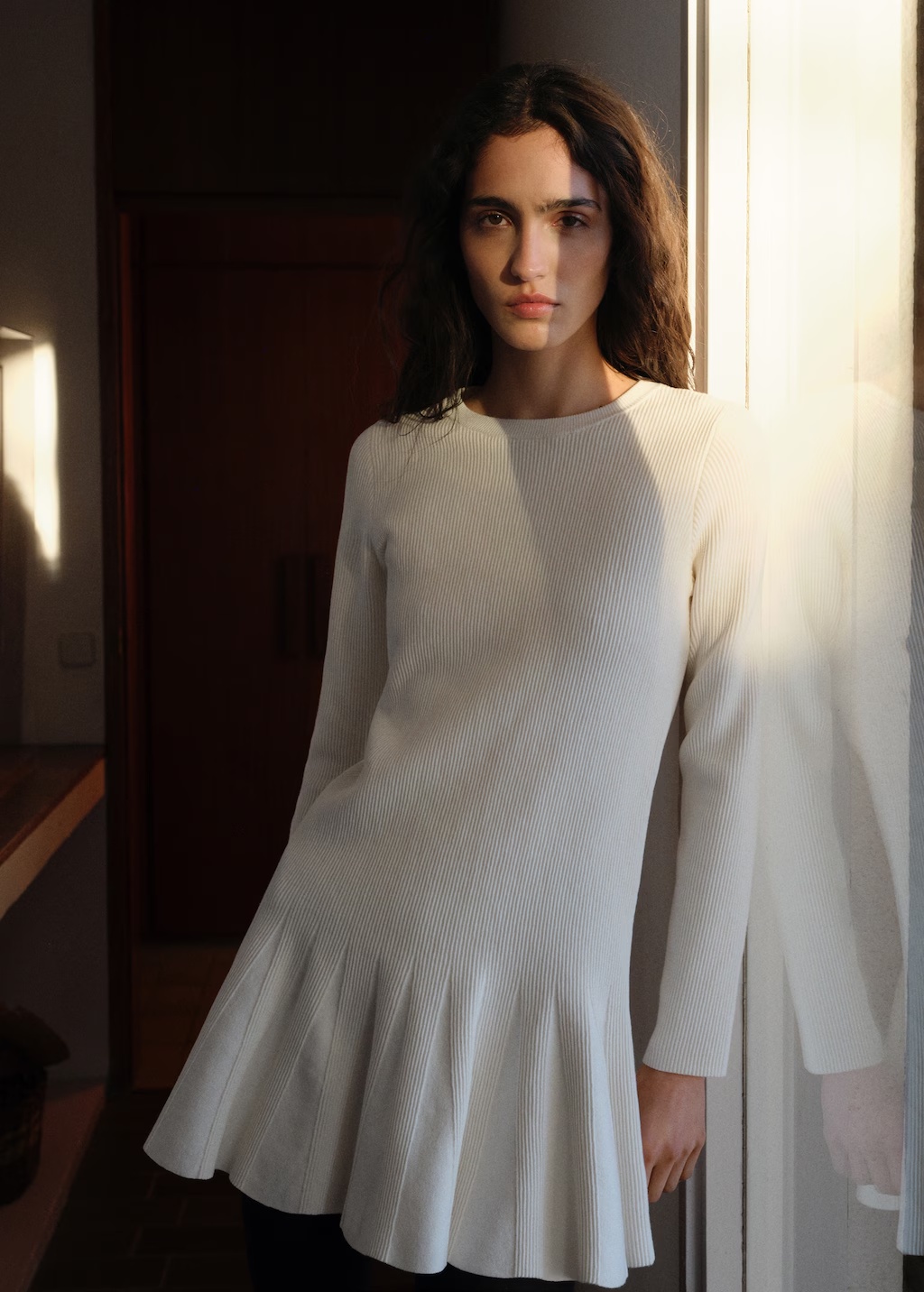 Short knitted dress with pleats